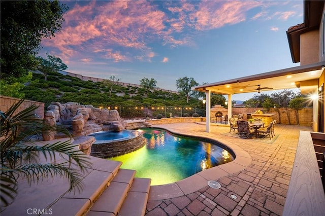 2583 N Skytop Ct, Orange, CA 92867 - view of swimming pool featuring a fenced backyard, a patio, a pool with connected hot tub, and outdoor dining area