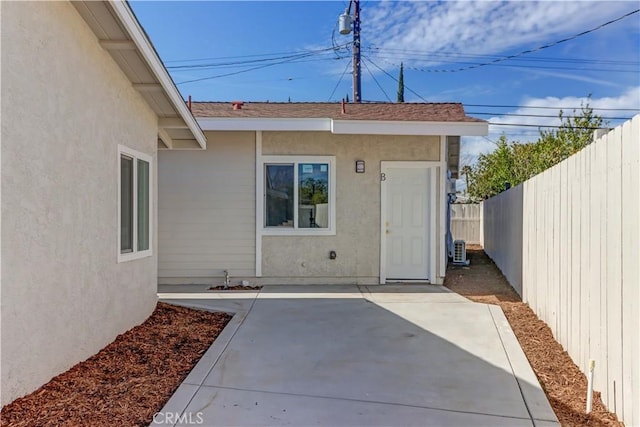 623 E Elm St, Ontario, CA 91761 - doorway to property featuring fence, a patio, and stucco siding