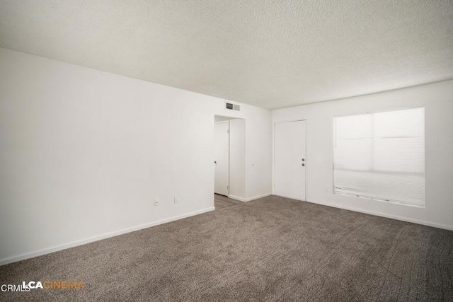 2617 Pinon Spring Cir Unit C, Bakersfield, CA 93309 - carpeted empty room with a textured ceiling and baseboards