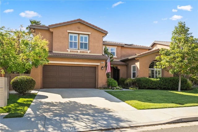 46397 Kohinoor Way, Temecula, CA 92592 - view of front of property with a tiled roof, concrete driveway, an attached garage, and a front yard