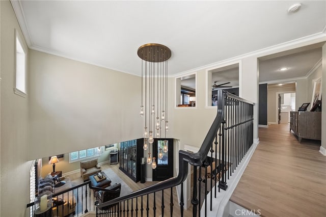 46397 Kohinoor Way, Temecula, CA 92592 - staircase with ornamental molding, wood finished floors, and a ceiling fan