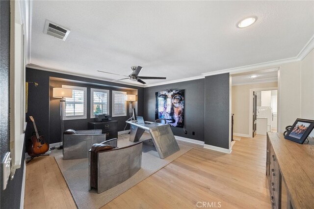 46397 Kohinoor Way, Temecula, CA 92592 - cinema featuring crown molding, a ceiling fan, and light wood-style floors