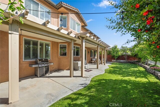 46397 Kohinoor Way, Temecula, CA 92592 - back of house featuring stucco siding, a patio area, and a pergola