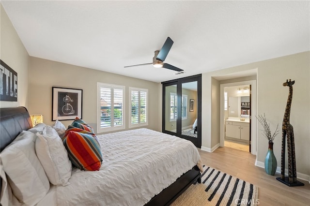 46397 Kohinoor Way, Temecula, CA 92592 - bedroom featuring light wood-type flooring, a ceiling fan, and connected bathroom
