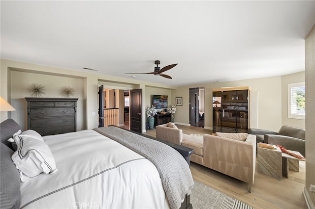 46397 Kohinoor Way, Temecula, CA 92592 - bedroom with light wood-style floors and ceiling fan