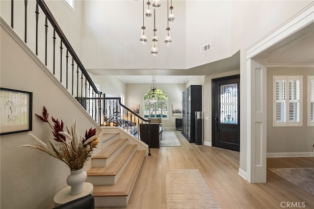 46397 Kohinoor Way, Temecula, CA 92592 - entryway with light wood finished floors, stairs, and a high ceiling