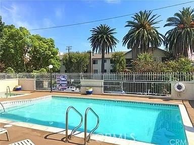 628 Daisy Ave Unit 420, Long Beach, CA 90802 - community pool featuring fence and a patio