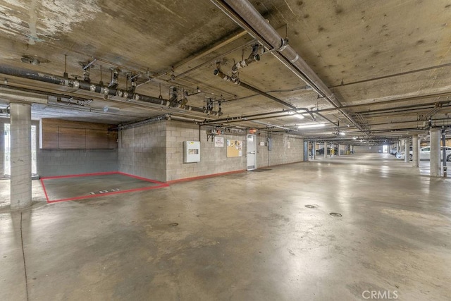 628 Daisy Ave Unit 420, Long Beach, CA 90802 - parking deck featuring concrete block wall