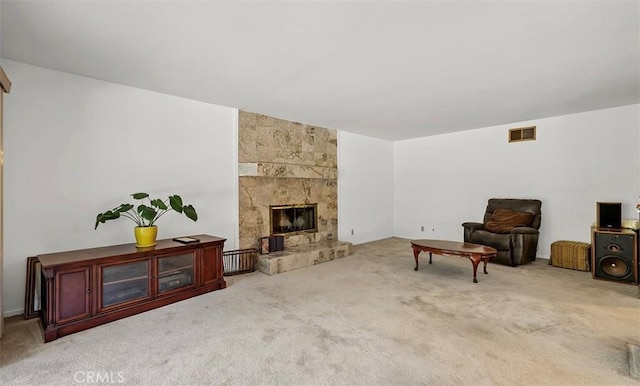 5340 Edgeware Dr, Calabasas, CA 91301 - carpeted living room with a stone fireplace