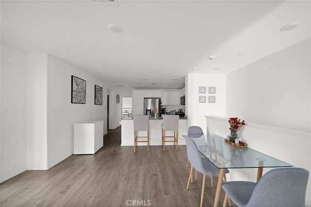 35753 Starling Ave Unit 1901, Murrieta, CA 92563 - dining area with wood finished floors