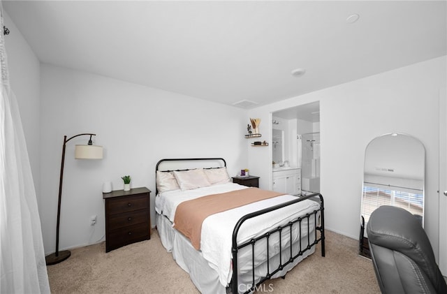 35753 Starling Ave Unit 1901, Murrieta, CA 92563 - bedroom featuring light colored carpet, ensuite bathroom, and arched walkways