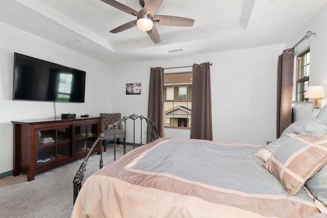 4304 Pacifica Way Unit 2, Oceanside, CA 92056 - carpeted bedroom with a tray ceiling and ceiling fan