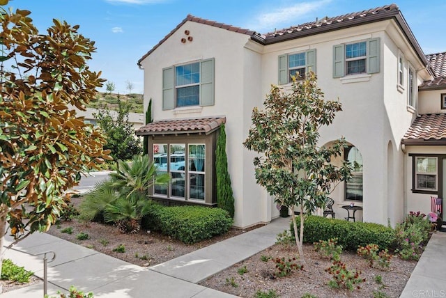 4304 Pacifica Way Unit 2, Oceanside, CA 92056 - mediterranean / spanish home featuring a tiled roof and stucco siding