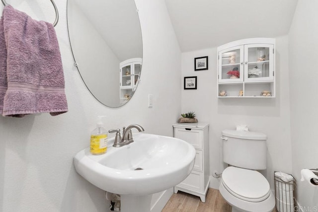 4304 Pacifica Way Unit 2, Oceanside, CA 92056 - half bath with wood finished floors and vaulted ceiling