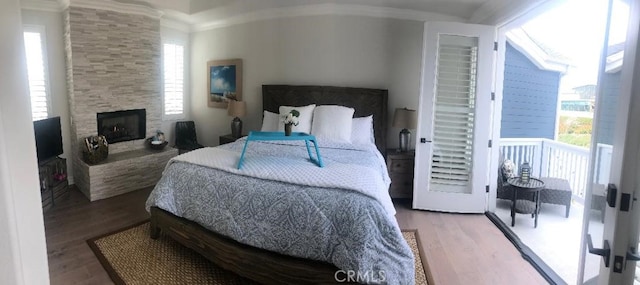 3401 5th Ave, Corona Del Mar, CA 92625 - bedroom with crown molding, wood finished floors, and a fireplace