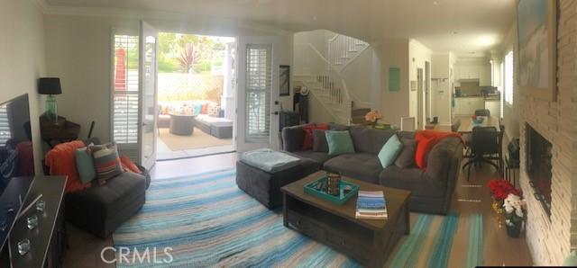 3401 5th Ave, Corona Del Mar, CA 92625 - living area featuring stairs and a fireplace