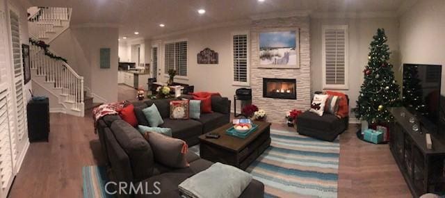 3401 5th Ave, Corona Del Mar, CA 92625 - living room with stairs, recessed lighting, a lit fireplace, wood finished floors, and ornamental molding