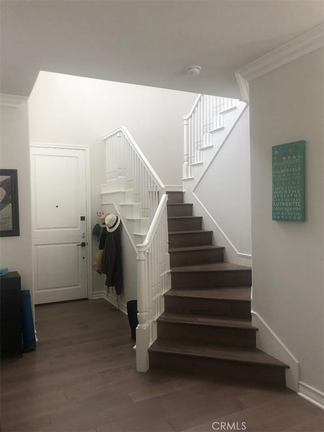 3401 5th Ave, Corona Del Mar, CA 92625 - stairway with wood finished floors, baseboards, and ornamental molding
