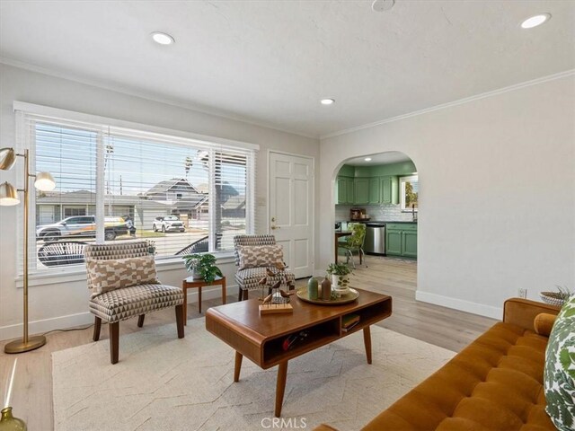 715 Bennett Ave, Arroyo Grande, CA 93420 - living area with arched walkways, ornamental molding, baseboards, light wood finished floors, and recessed lighting
