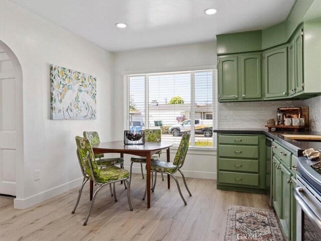 715 Bennett Ave, Arroyo Grande, CA 93420 - dining area featuring arched walkways, light wood-type flooring, baseboards, and recessed lighting