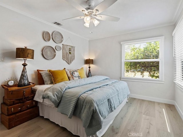 715 Bennett Ave, Arroyo Grande, CA 93420 - bedroom with light wood finished floors, baseboards, crown molding, and ceiling fan