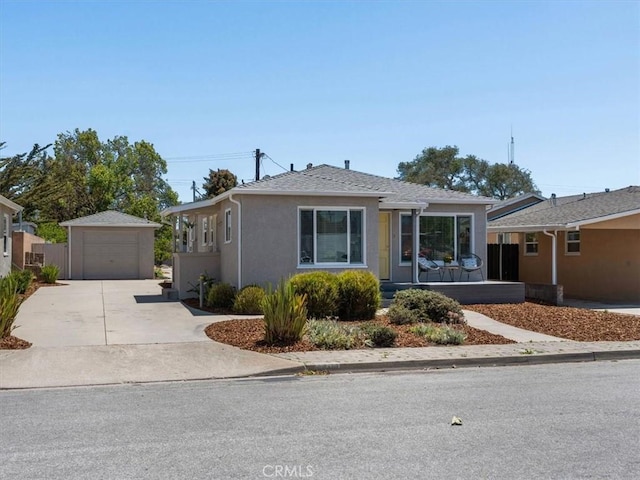 715 Bennett Ave, Arroyo Grande, CA 93420 - bungalow-style house with an outbuilding, concrete driveway, stucco siding, and a detached garage