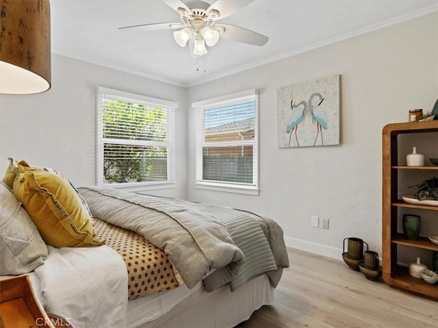 715 Bennett Ave, Arroyo Grande, CA 93420 - bedroom with wood finished floors, crown molding, baseboards, and ceiling fan