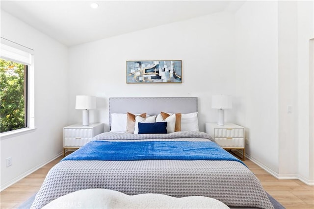 1817 Borrego Dr, West Covina, CA 91791 - bedroom with light wood-style flooring, lofted ceiling, and baseboards