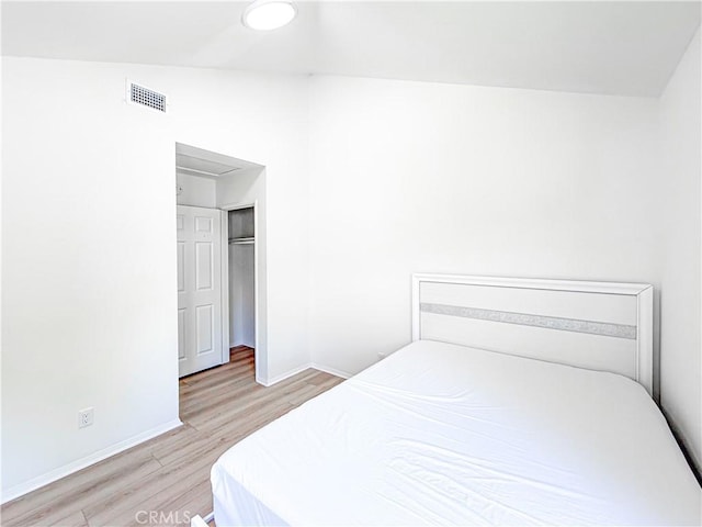 1817 Borrego Dr, West Covina, CA 91791 - bedroom with light wood-style floors, baseboards, a walk in closet, and a closet