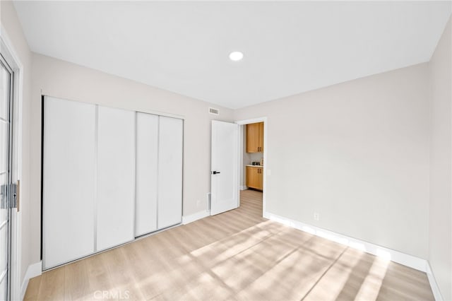 29140 Via Norte, Temecula, CA 92591 - unfurnished bedroom featuring a closet, light wood-style flooring, and recessed lighting