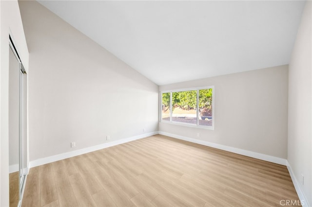 29140 Via Norte, Temecula, CA 92591 - unfurnished bedroom featuring vaulted ceiling, light wood-style floors, and a closet