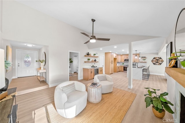 29140 Via Norte, Temecula, CA 92591 - living room featuring wine cooler, ceiling fan, light wood finished floors, high vaulted ceiling, and recessed lighting