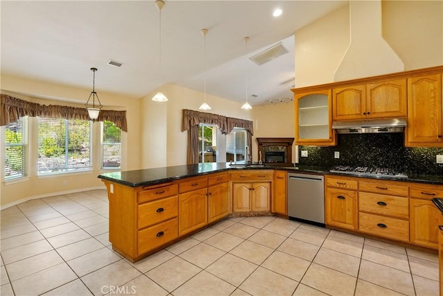 9539 Carmel Rd, Atascadero, CA 93422 - kitchen featuring stainless steel appliances, light tile patterned floors, a peninsula, tasteful backsplash, and hanging light fixtures