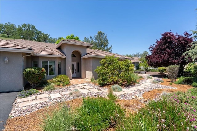 9539 Carmel Rd, Atascadero, CA 93422 - view of front of house with stucco siding and a tiled roof