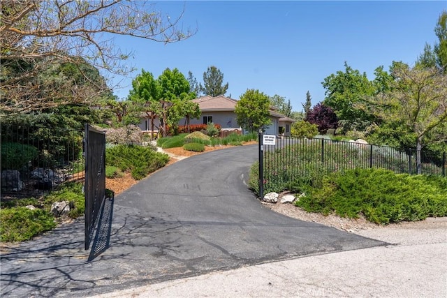 9539 Carmel Rd, Atascadero, CA 93422 - view of property hidden behind natural elements with asphalt driveway