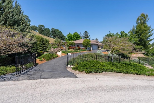 9539 Carmel Rd, Atascadero, CA 93422 - view of front of property featuring a garage and asphalt driveway