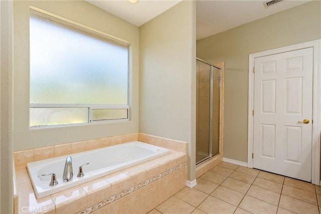 9539 Carmel Rd, Atascadero, CA 93422 - full bath featuring tile patterned flooring, a stall shower, and a bath