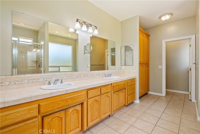 9539 Carmel Rd, Atascadero, CA 93422 - full bathroom featuring a stall shower, double vanity, and tile patterned flooring
