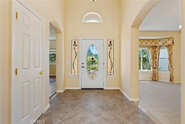 9539 Carmel Rd, Atascadero, CA 93422 - tiled entrance foyer featuring arched walkways and baseboards
