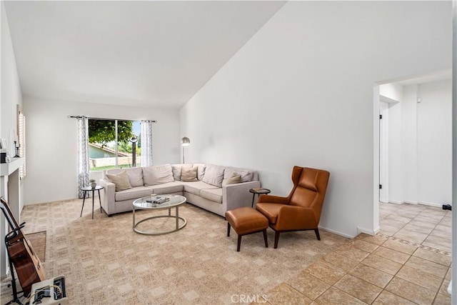 living room featuring vaulted ceiling