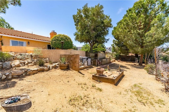 view of yard with fence