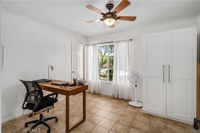 office area with ceiling fan, light tile patterned flooring, and baseboards