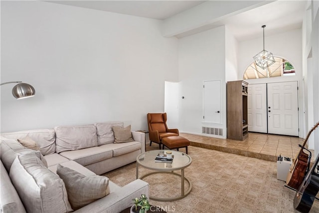 living area featuring high vaulted ceiling