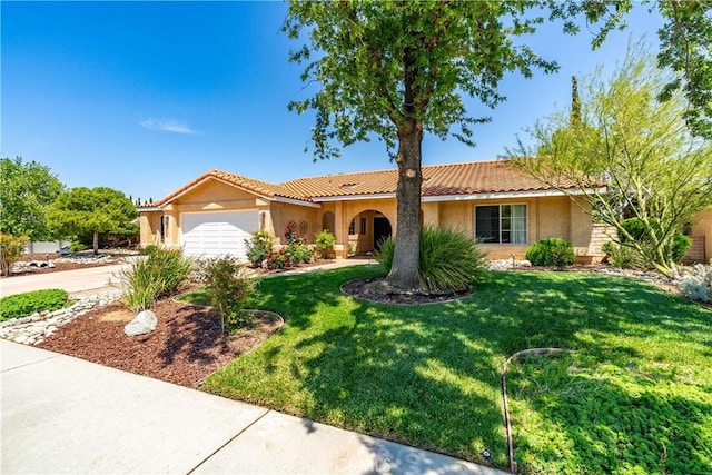 view of front of home featuring a garage, stucco siding, concrete driveway, and a front lawn