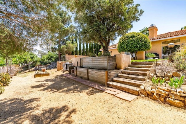 view of yard with fence