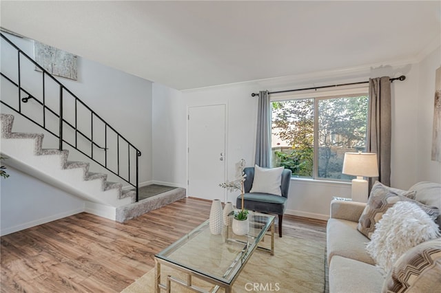 762 Dragonfly Ct, San Jose, CA 95133 - living area featuring stairway, wood finished floors, baseboards, and ornamental molding
