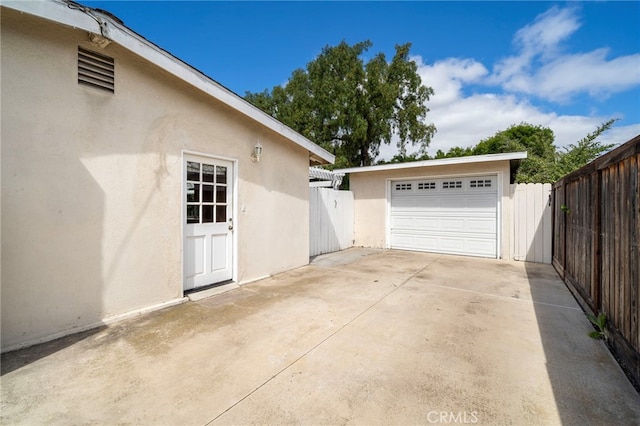 detached garage with fence