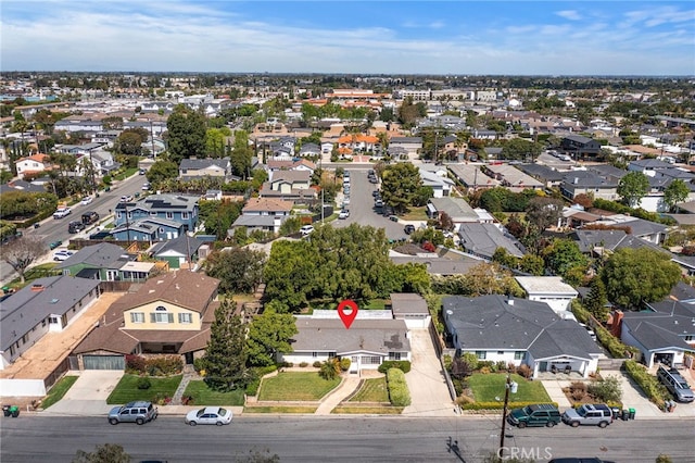aerial overview of property's location with nearby suburban area