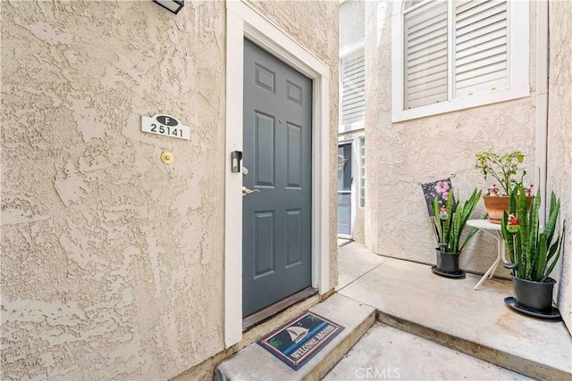 25141 La Jolla Way Unit F, Laguna Niguel, CA 92677 - property entrance featuring stucco siding