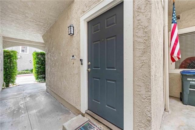 25141 La Jolla Way Unit F, Laguna Niguel, CA 92677 - property entrance with stucco siding